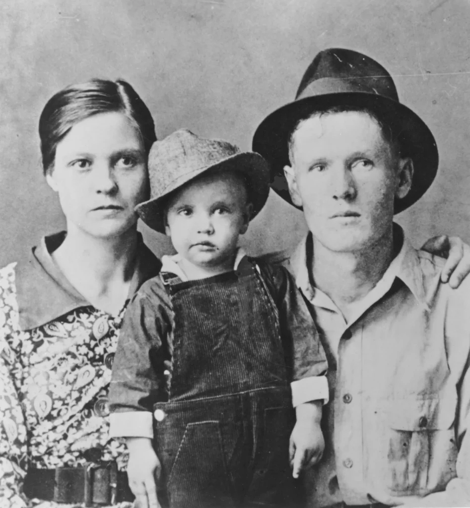 Elvis Presley, aged 3, with his parents, Gladys and Vernon, for the Iconic Elvis article in free reads.