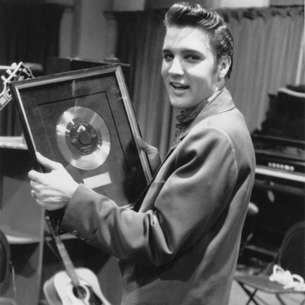 Elvis receiving his first Gold Record for “Heartbreak Hotel”, April 14, 1956.