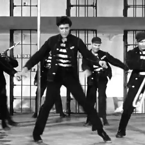 Elvis performs “Jailhouse Rock”.