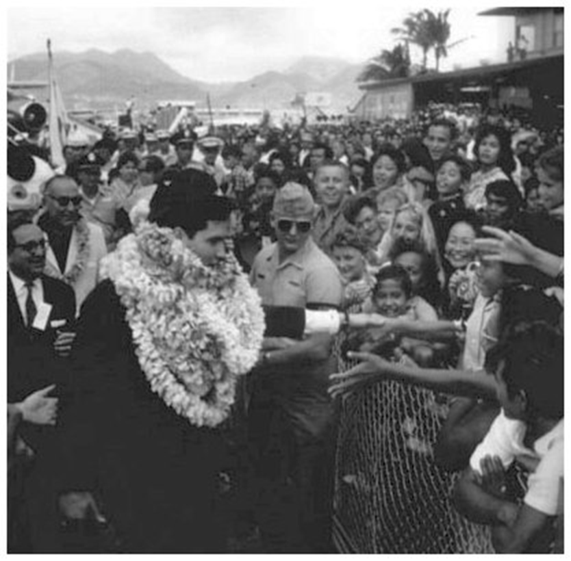 Elvis arrives at Honolulu International Airport, March 25, 1961,ahead of the Pearl Harbor Concert.