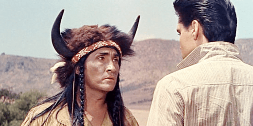 Buffalo Horn (Rodolfo Acosta) questions Pacer about his loyalties.